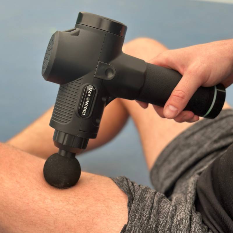 pistolet-de-massage-tete-boule-cuisse